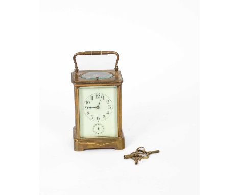 A gilt brass cased carriage clock, the rectangular dial with Arabic numerals and subsidiary alarm dial, repeat mechanism, lat