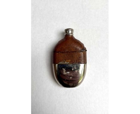 A novelty vesta case, modelled as a hip flask with half leather cover, 6cm long