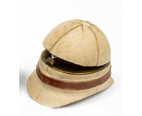 A novelty travel inkwell, modelled as a pith helmet, 6.5cm long