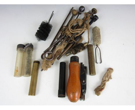 A quantity of gun cleaning tools