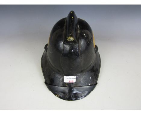 A mid-20th Century fireman's helmet