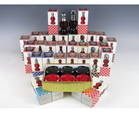 A quantity of Avon after shave and lotion bottles in the form of chess pieces together with a draughts set