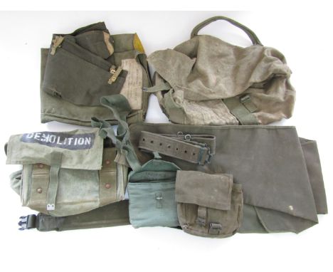 A quantity of post-War military kit including a tropical Bren cover, folding saw, gun slips etc