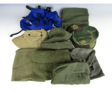 Sundry military headgear including a flight deck crewman's helmet cover