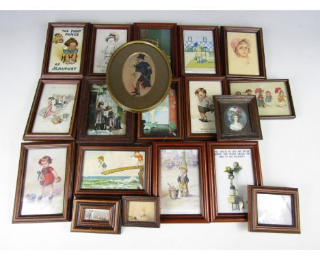 A quantity of framed vintage postcards and miniatures