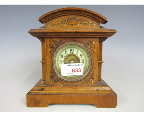 A late 19th century mantel clock with replacement quartz movement