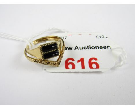 A vintage 9ct gold and black onyx dress ring together with a 9ct gold wishbone ring, 2.1g total
