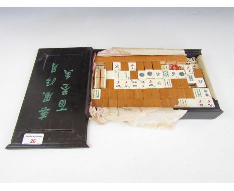A vintage mah-jong set with bone and bamboo pieces (incomplete)