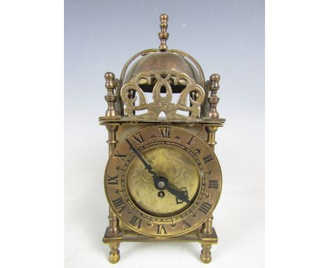 A Smiths brass lantern clock