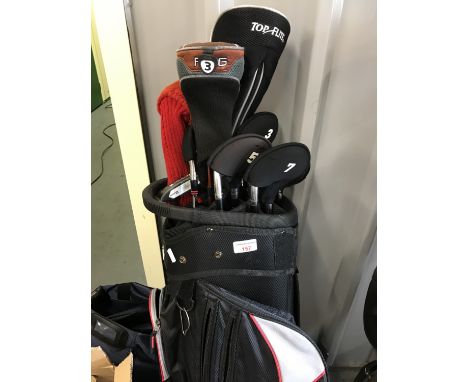 A Moto caddy golf bag with clubs