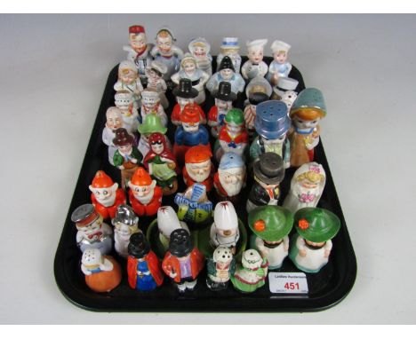 A large quantity of vintage novelty salt and pepper shakers including gnomes, a bride and groom and two Hummel pairs etc