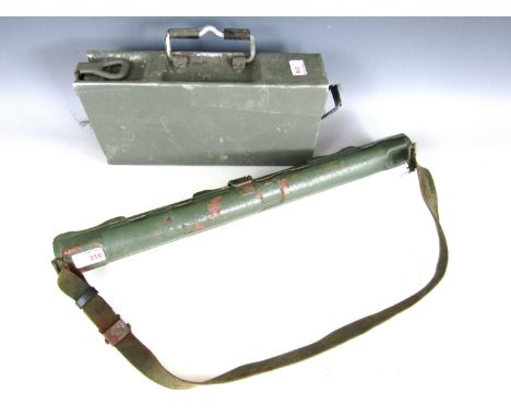 A Wehrmacht aluminium machine gun ammunition tin and a post-War machine gun spare barrel carrier
