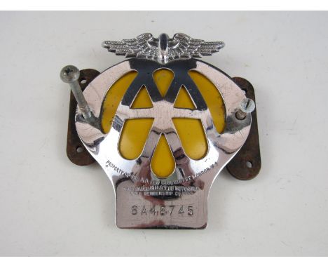 A vintage AA badge