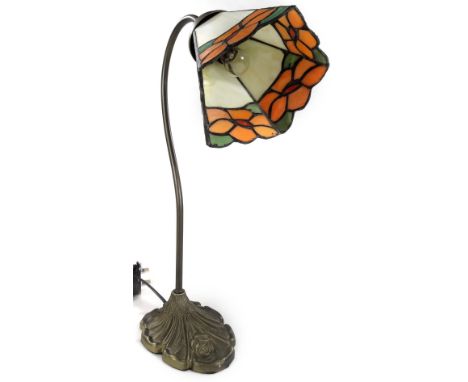 *An as new table lamp, with Tiffany style shade and shaped stem, 38cm H.