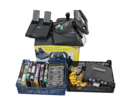 A Nintendo 64 games console, 25cm W, with controllers and games, Playstation 1 games and a Jordan wheel.  (a quantity, partia
