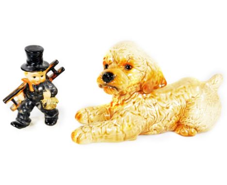 A Goebel Hummel figure, boy sweep no. KF40, 15cm H, another Hummel figure recumbent puppy no. 3315.  (2)