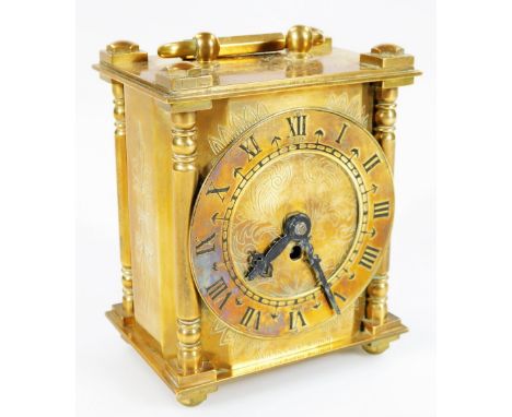 An early 20thC Smith's lantern clock, the 7.5cm Dia, chapter ring with Roman numerals, revealing a keywind movement, in a sha