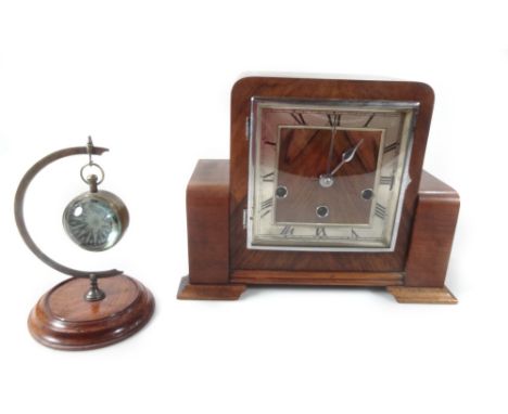 A 1950's vintage Art Deco walnut chiming mantel clock, with silvered 14cm Roman numeric dial and pendulum swung movement, chi