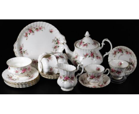 A Royal Albert Lavender Rose part tea service, comprising of a teapot, 22cm H, serving plate, milk jug, sugar bowl, cups, sau