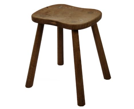 A Robert Thompson of Kilburn  Mouseman stool, with shaped saddle seat carved with mouse, on turned quadruple legs, 45cm H, 38