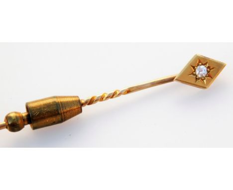 A stick pin, set with tiny diamond in diamond shaped topper, yellow metal, marked 18ct, 6cm long, boxed.