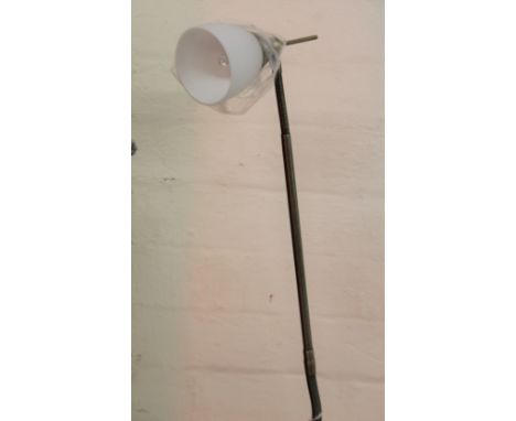 *An as new electrical adjustable standard lamp, with circular shade on cylindrical stem and circular foot, 160cm H.