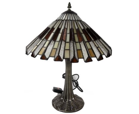 *An as new table lamp, with Tiffany style Art Deco design shade, predominately in orange and cream, 55cm H.