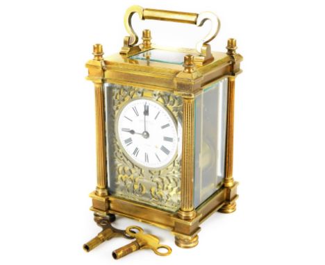 A 19thC brass repeating carriage clock, the 6cm Dia. enamel dial with Roman numerals marked Hancocks &amp; Co, 58 Bruton Stre