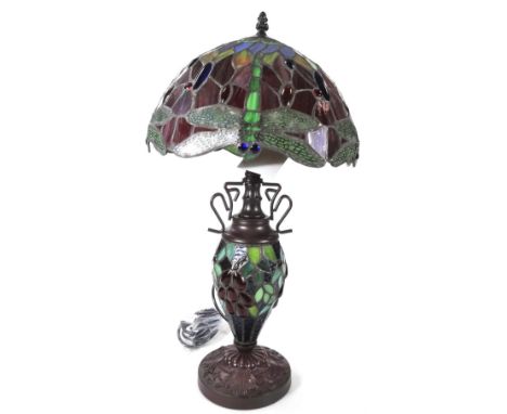 *An as new table lamp, with Tiffany style floral shade, on circular foot, 62cm H.