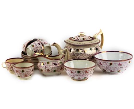 An early 19thC Staffordshire pink lustre part service, comprising of a teapot, 17cm H, slop bowl, sugar bowl, milk jug, cups 