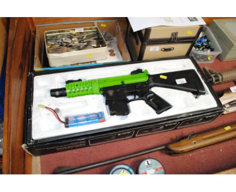 An AGM automatic electric BB gun, boxed&nbsp; NB. As a post 1939 air weapon the restrictions of the crime Reduction Act apply