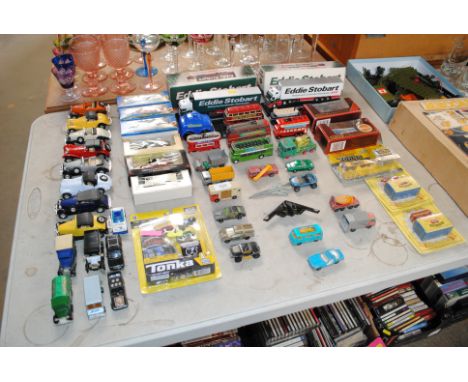 A quantity of mostly boxed model vehicles including two Eddie Stobbart trucks