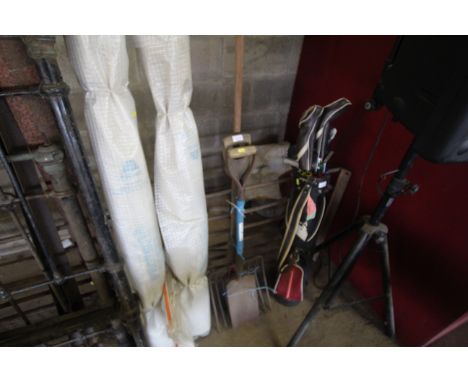 A small quantity of gardening tools to include digging spade, large fork, garden hoe etc.