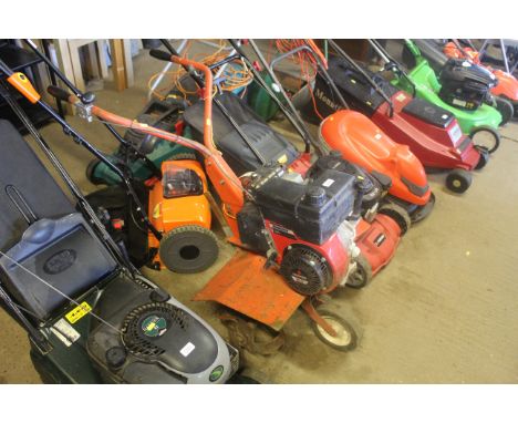 A petrol rotavator with TECUMSEH 5.0 petrol engine