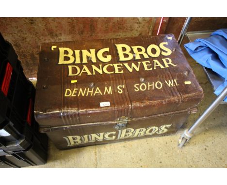 A metal decorated tin trunk for "Bing Bros. Dancewear, Denim St. Soho, W.1."