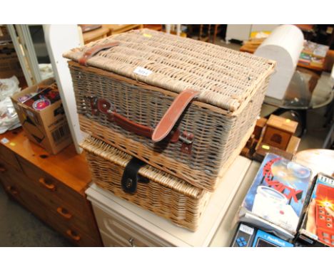 Two wicker hamper baskets and miscellaneous contents
