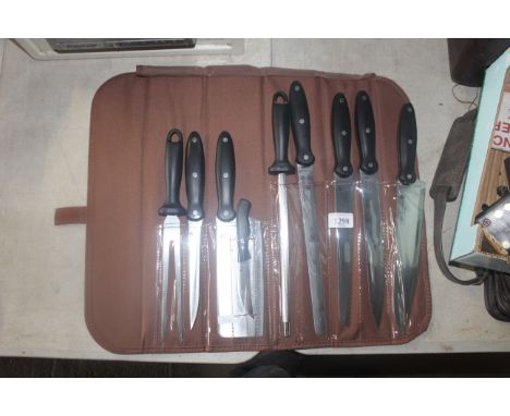 A Waltman Und Sohn nine piece knife set in roller carry bag (44)
