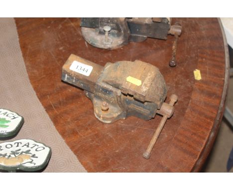 A small Woden bench vice 