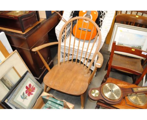 An Ercol stick back rocking chair