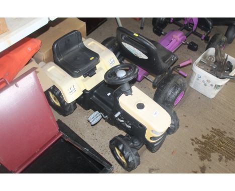 A child's pedal tractor 