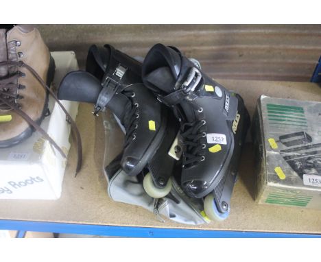 A pair of Roces 4-in-line roller skates (Size UK 5/6) with original carry bag