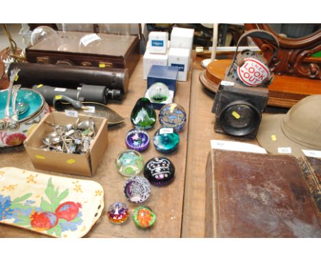 A collection of various Caithness and other paperweights