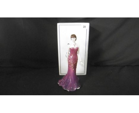 A BOXED ROYAL WORCESTER FIGURE RUBY
