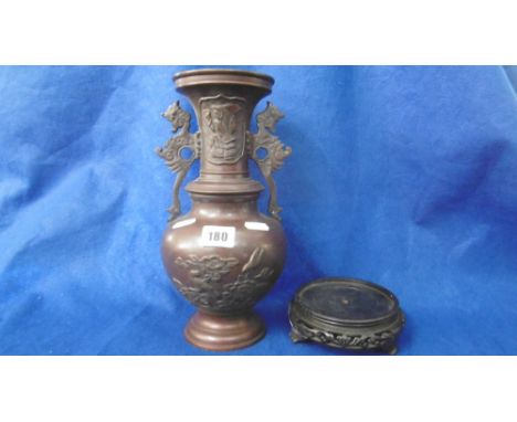 A BRONZE JAPANESE TWO HANDLED VASE