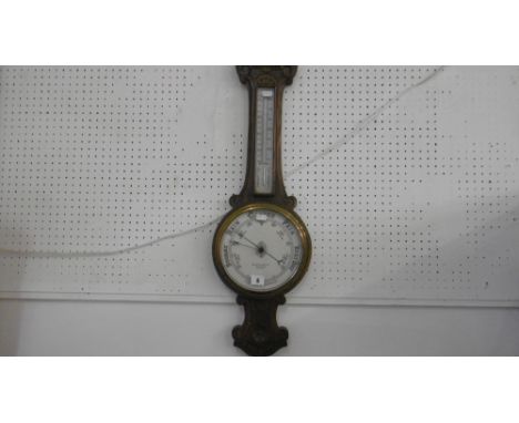 A BAROMETER/THERMOMETER