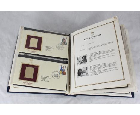A collection of approximately 110 '22ct Golden Replicas of British Stamps' across four albums, together with a Chinese philat