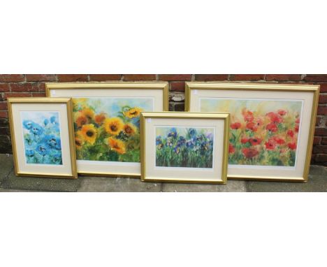 Four assorted signed prints after Ute Mertens, all depicting studies of flowers, largest measures 50 x 70cm 