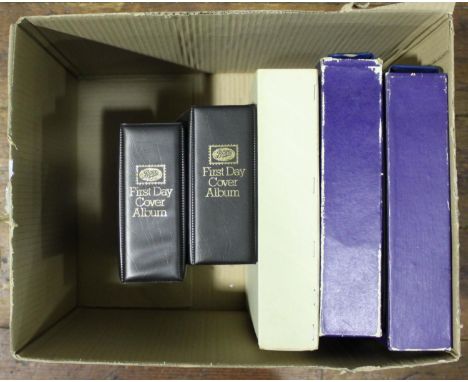 A collection of approximately 214x First Day Covers, in five ring binders 