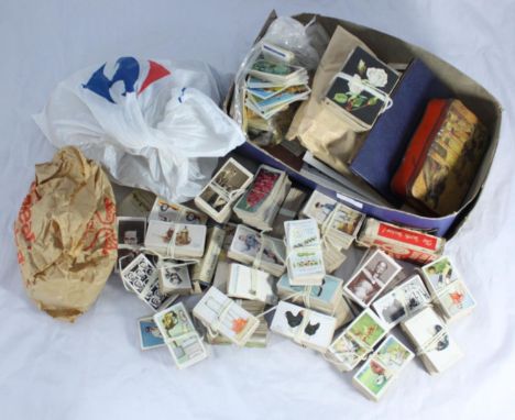 A large collection of assorted cigarette cards, largely Player's examples, some Will's, Ogden's and Churchman's etc. various 