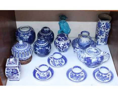 SECTION 15.  A quantity of Oriental blue and white ceramics including a teapot, cups and saucers, ginger jars and vases etc. 